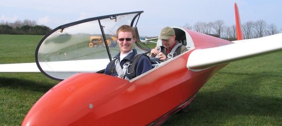 Me and Gunner (on the back seat) in the plane.