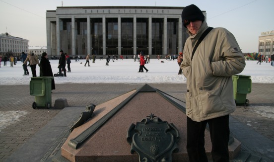 It is very difficult to see, but the person with the black hat on the picture is actually me as an secret under-cover agent working for the Danish Intelligence Agency. My cover is due to the fact that the above picture is taken at the very center of Belarus - at least that was what was written on the stone.