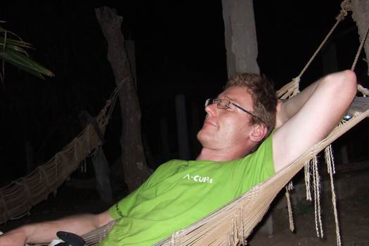 Me resting in a hammock in our hotel in Fajara just outside Banjul after a long tiring day on the road. When we entered The Gambia we abandoned our bus in favor of a smaller bush taxi from the Gambian border to the ferry going to Banjul. We seated an old but quite nice looking Ford Transit. Midway to the ferry a loud bang roared the bus and my eyes followed the side-door to my right flying out of the car landing some five meters behind us. I cried of laughter even louder than the noise the door get-a-way created, while watching the driver mounting the door back on. I think my reaction was due to the fact that that was really what I somehow expected from visiting Africa - sorry folks!